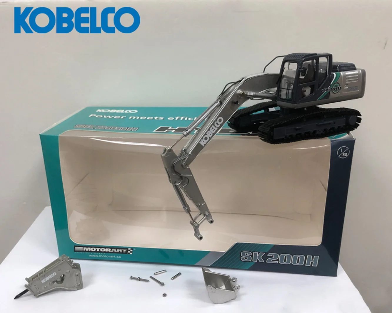 Гибридный экскаватор Motorart 1/50 KOBELCO SK200H-10 с отлитым под давлением молотковой дрелью