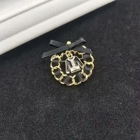 luxury brand suit brooches retro exquisite coat clothes dripping oil black bow knot all matching women jewelry accessories