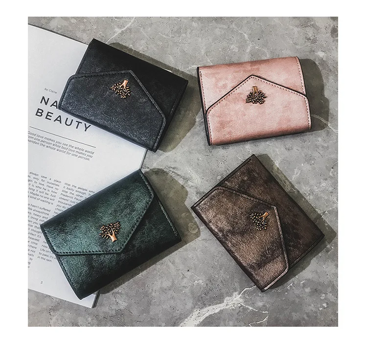

Net red retro small wallet short 2021 simple women's three fold buckle pocket