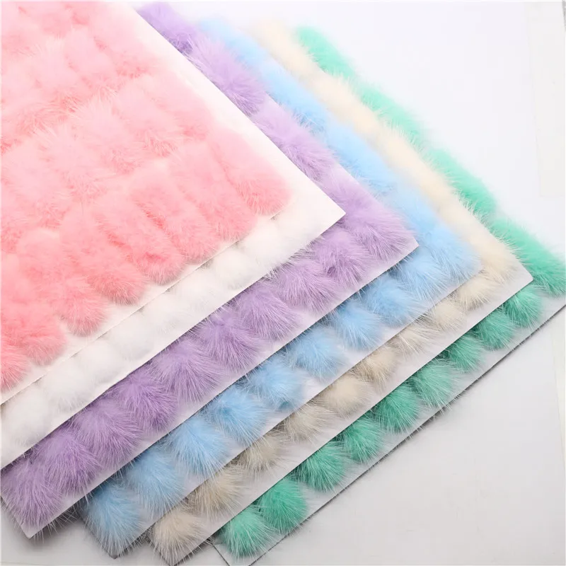 Помпон из меха норки 3 х7 см с бантом