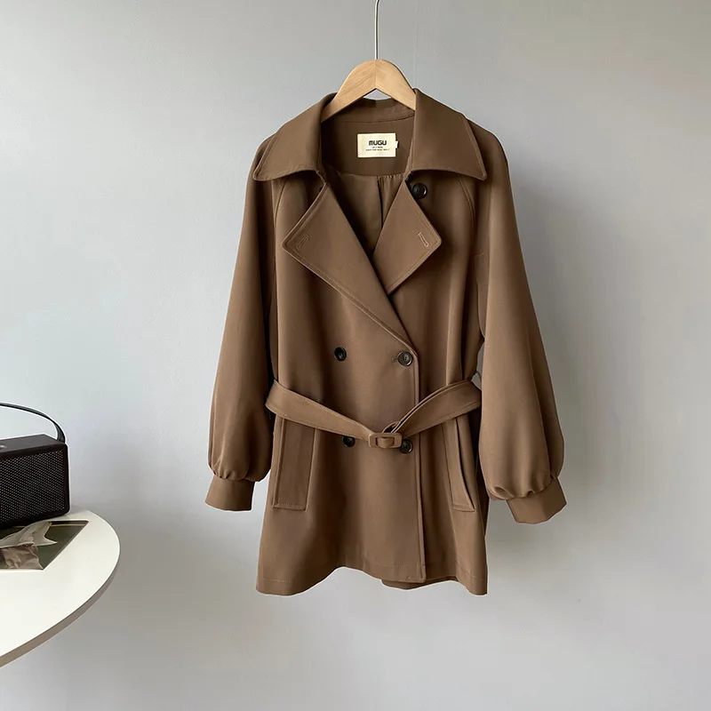 

Однотонная ветровка средней длины с поясом в Корейском стиле, женское свободное короткое пальто на весну и осень, модный двубортный тренчко...