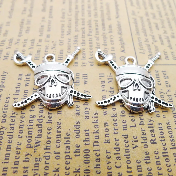 

8Piece/Lot 24*25mm Alloy Skull Head With Knife Charms For Jewelry Making DIY Findings Handmade Craft Pendant