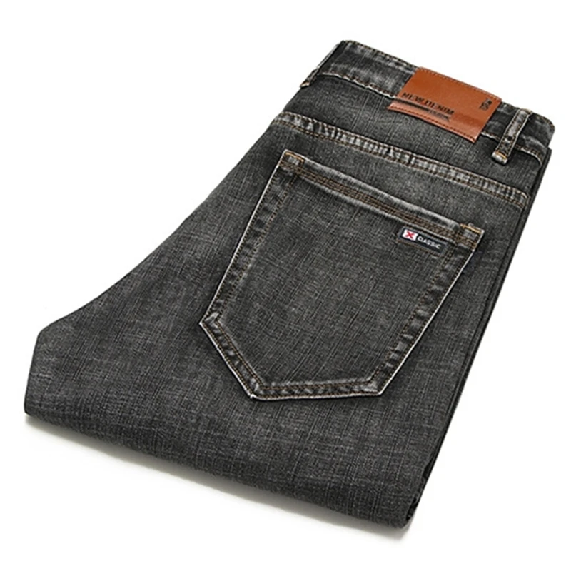 

2020 autumn new Men's Fashion Jeans Classic solid color business casual denim pants Middle-aged stretch loose straight trousers