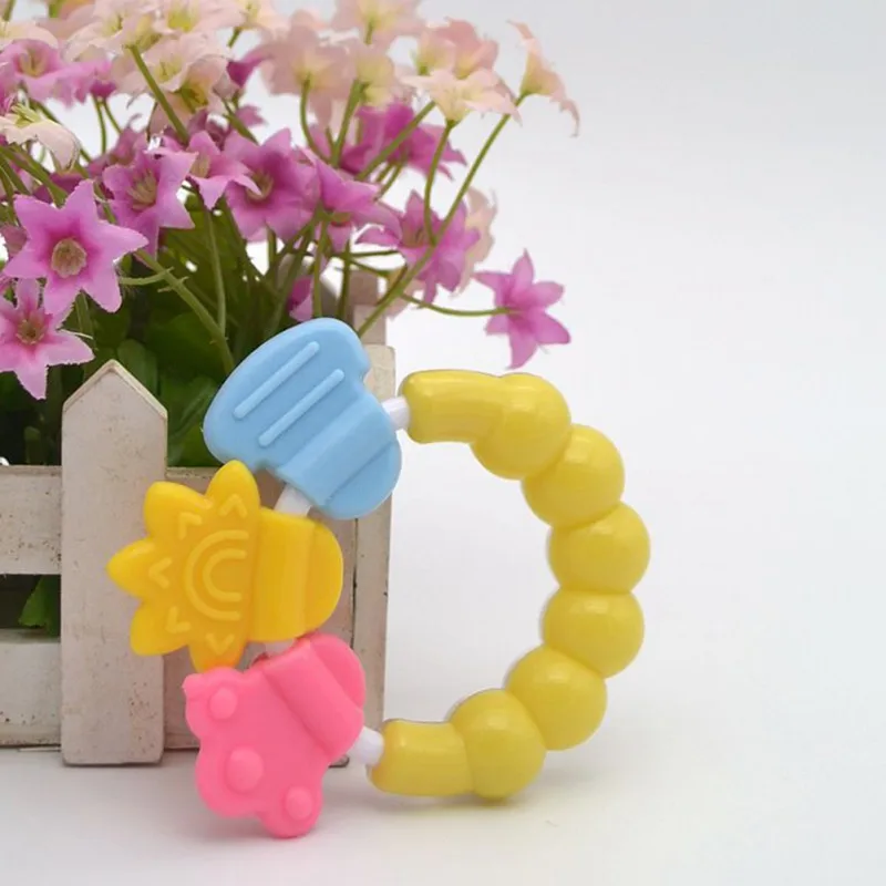 Детская игрушка для прорезывающихся зубов с героями мультфильмов зубы кусаются