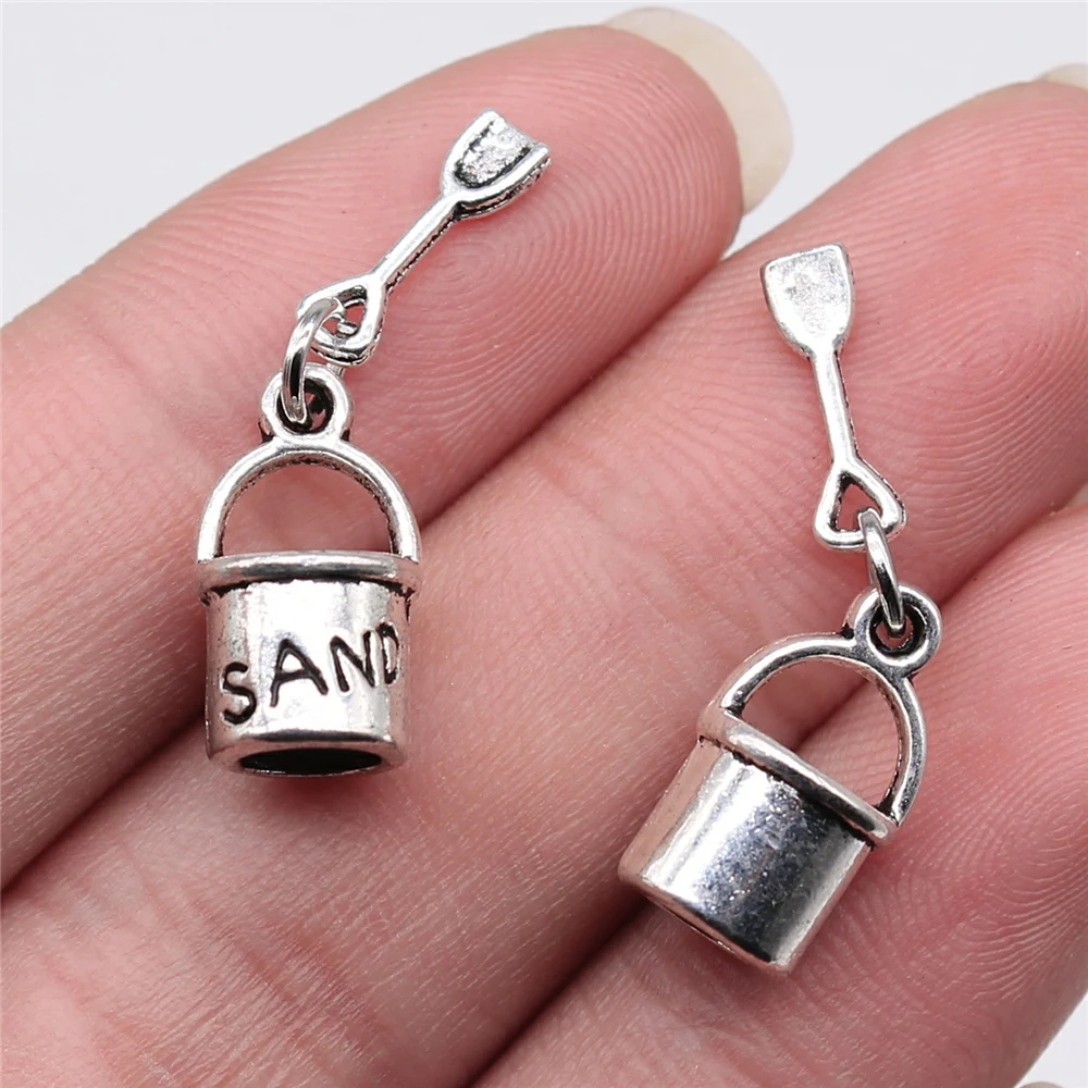 

WYSIWYG 10pcs 28x9mm Antique Silver Color Beach Bucket Shovel Charms Pendant For Jewelry Making DIY Jewelry Findings