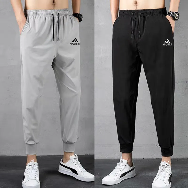 

Fashionable Men's Sports Pants Quick-drying Loose Size Running Fitness Casual Pants Sports Pants Men's Jogging Pants 2021 Spring