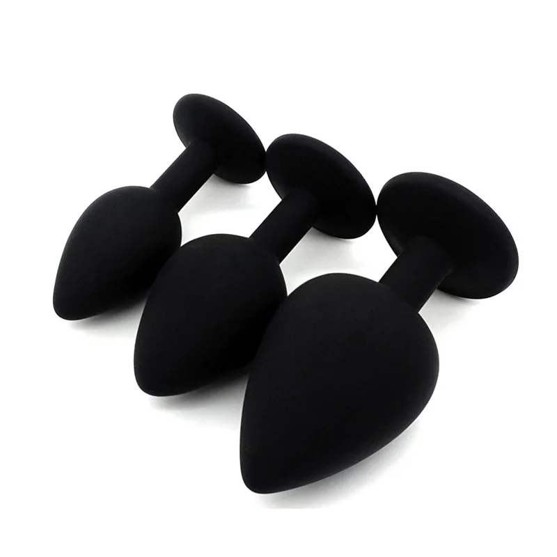 Силиконовые анальные пробки и вибратор фаллоимитатор с украшением в виде