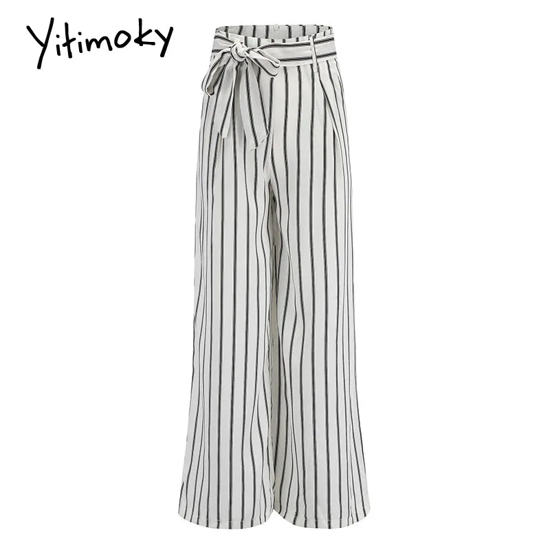 Весенние женские штаны с завязками на молнии черные полосатые белые высокой