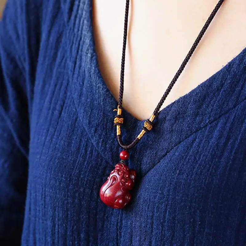 

Natural Cinnabar Pendant High Content Purple Gold Sand Original Stone Crystal Ruyi Animal Pendant