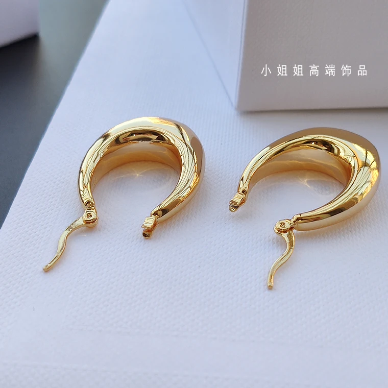 

Gold water drop egg-shaped earrings cold wind retro simple oval circle earrings