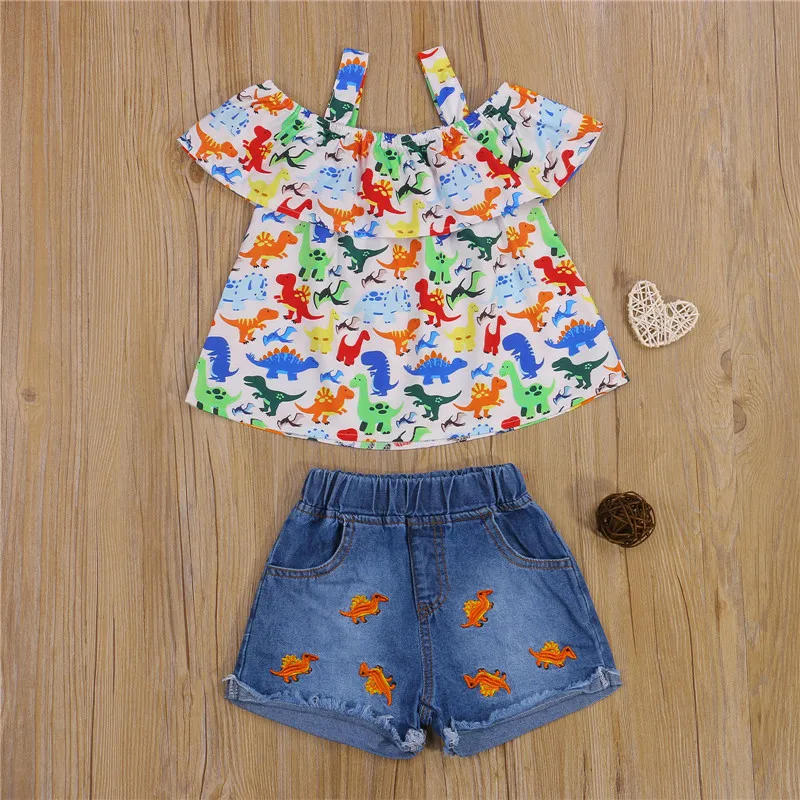 

Комплект одежды для маленьких девочек из 2 предметов, летний топ с мультяшным принтом динозавров + джинсовые шорты с вышивкой животных, комп...