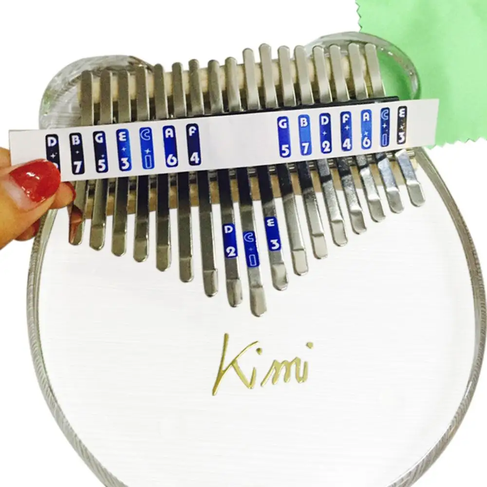 

Kimi Kalimba Thumb Piano 17 Key Acrylic Transparent Thumb Piano with Tuner Hammer Gig Kalimba Case Manual