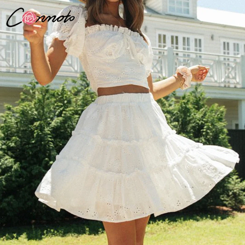 

Conmoto Roman holiday style two pieces ruffled women set summer Romantic puff sleeve top and embroidery skirt Bow sash slim suit