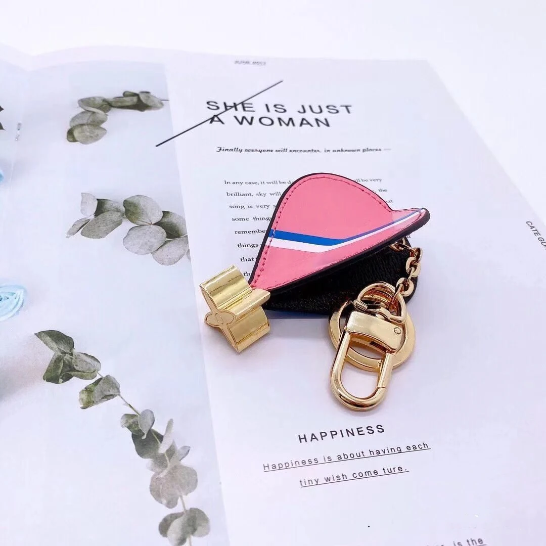 

Hotsell Luxury Presbyopia Mouse Brown Leather Keychain Woman Purse Bag Pendant Car Key Ring Accessories Couple Best Gift New