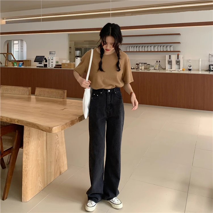 

High waist and wide leg jeans and long trousers woman