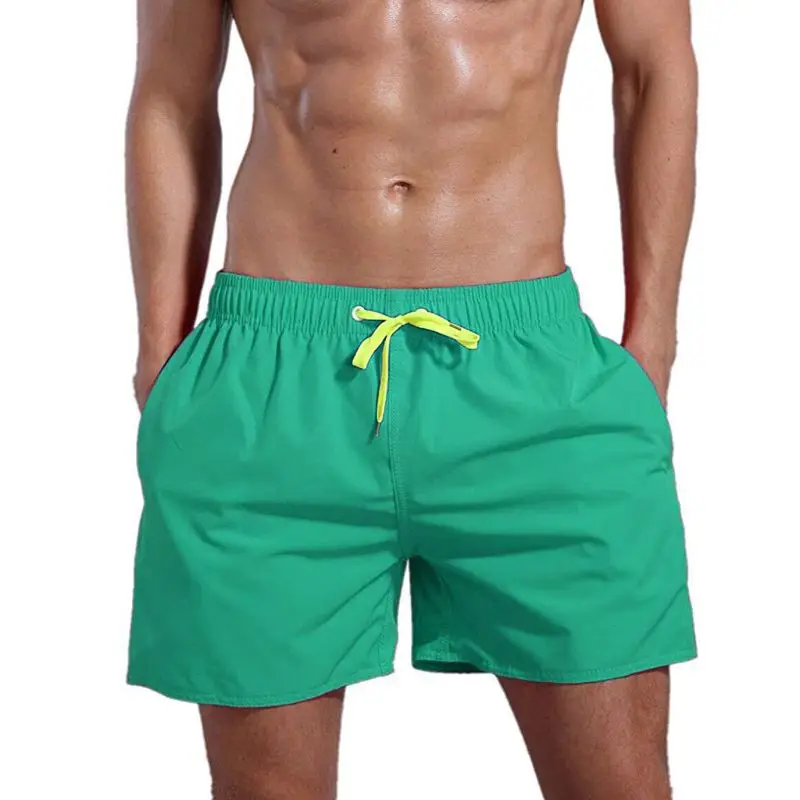 

Men Summer Mid Rise Drawstring Swim Solid Color Quick Dry Cotton Shorts Mesh Lining Casual Beach Pants With Zipper Pocket