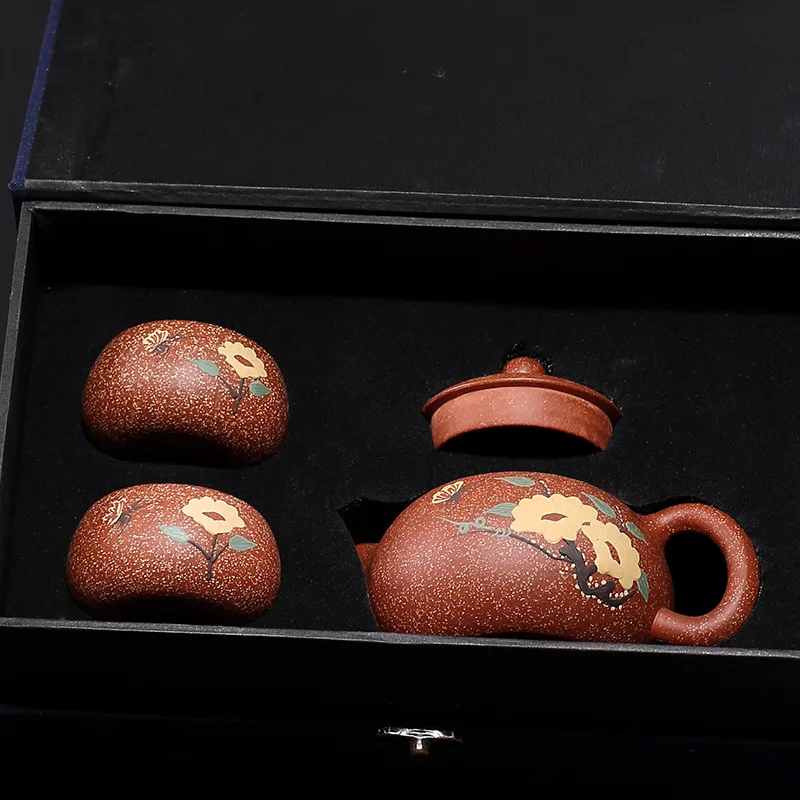

Purple clay teapot dragon blood sand Xishi gift set engraving tea set nine piece group teapot engraving meeting