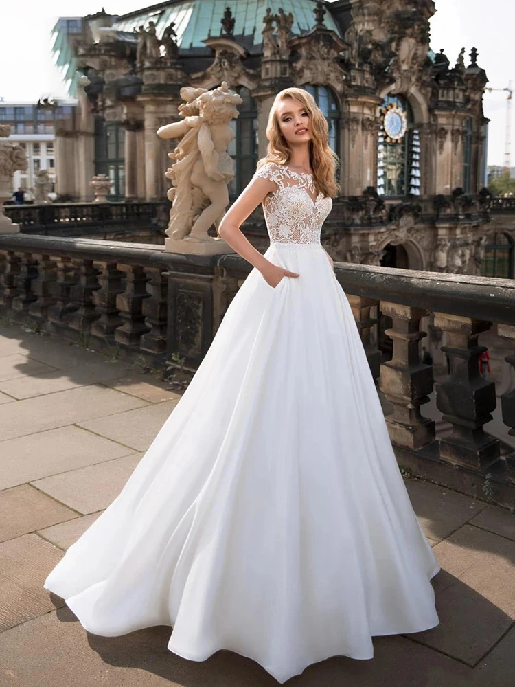 

Wedding dress Boho Bridal Gown Lace O-neck Simple Atmosphere Bride Dress Sleeveless A Font Tailing Custom Made Plus Size