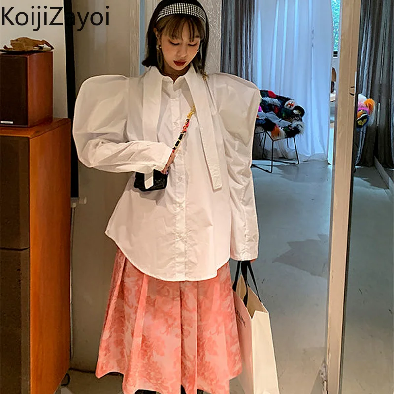 

Женская однобортная блузка с рукавами-фонариками и отложным воротником