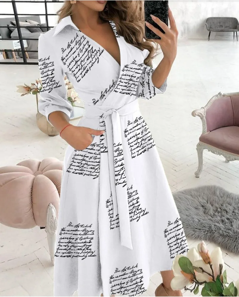 

2021 explosions spring and summer fashion long sleeve V-neck printed hip dress women's clothing