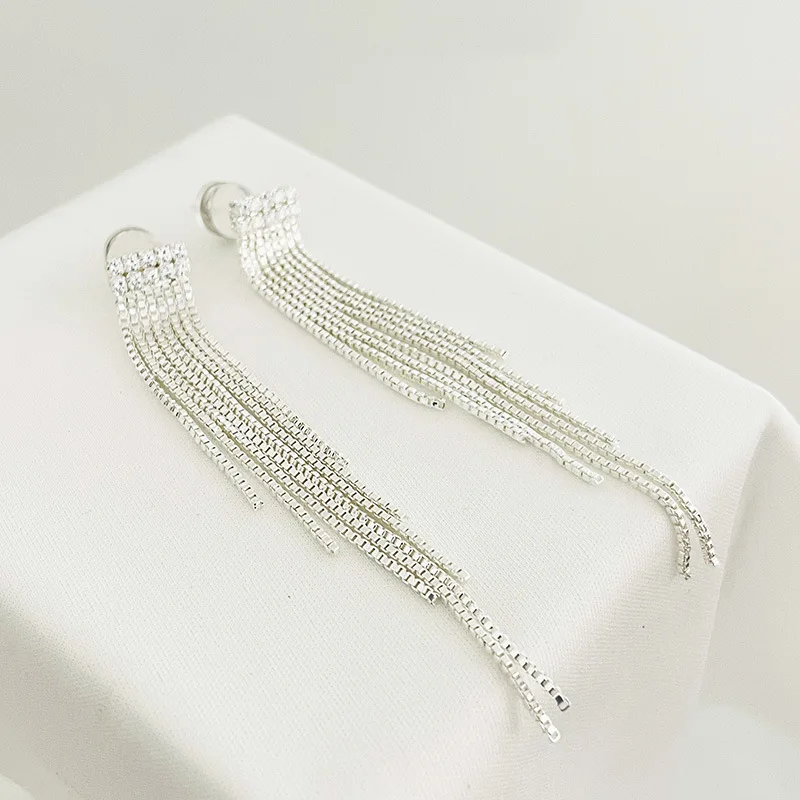 

Женские серьги-гребни с цепочкой, серебряного цвета