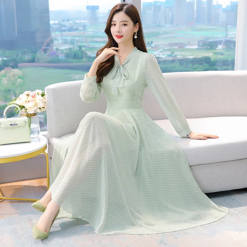 

Korean version of the large-size lace-up V-neck polka dot printing temperament is slim and white long-sleeved chiffon dress
