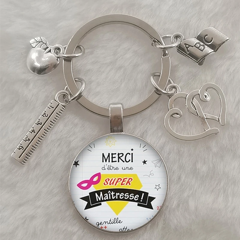Fashion merci maitresse French word 25 mm glass cabochon dome DIY jewelry making keychain | Key Chains