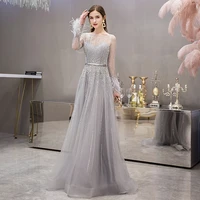 dubai evening dresses long sleeve with feathers luxury sexy sheer o neck engagement party gown beaded gold grey vestido de festa
