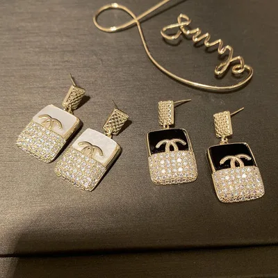 

White Fritillaria Earrings For Women S925 Silver Earrings Micro-inlaid Sweet And Small Diamond Creative Wavy Letter Jewelry