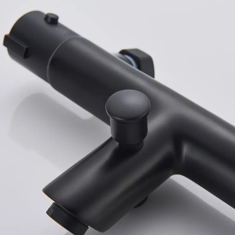 Термостатический смеситель для душа с черным рисунком термостатический ванной