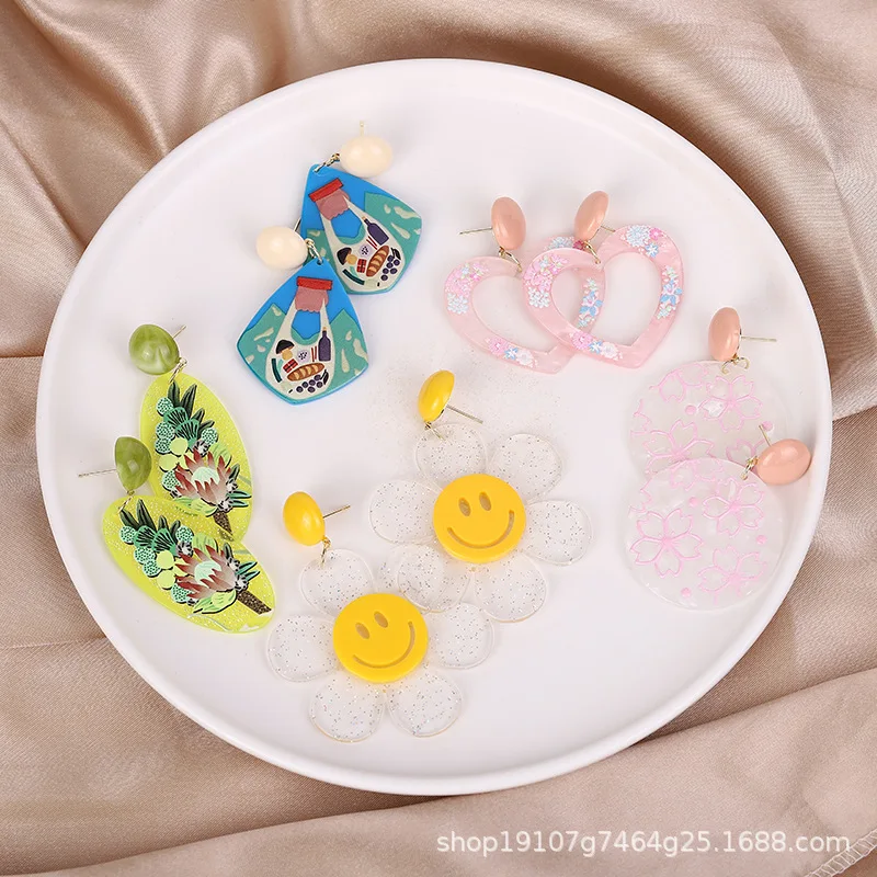 

European and American pastoral cartoon character children cute smiley love yellow ethnic style flower tassel leaf women earrings