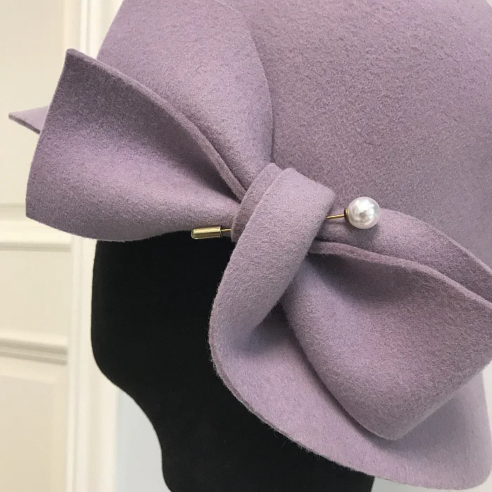 

2021 Autumn And Winter New Bucket Basin Of Bowknot Pearl Wool Hat Female Warm Fashion Female Warm