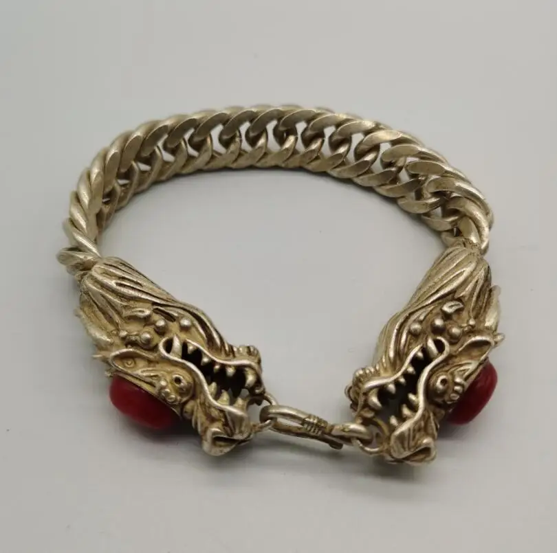 

China White copper inlay imitation gem double dragon head Bracelet