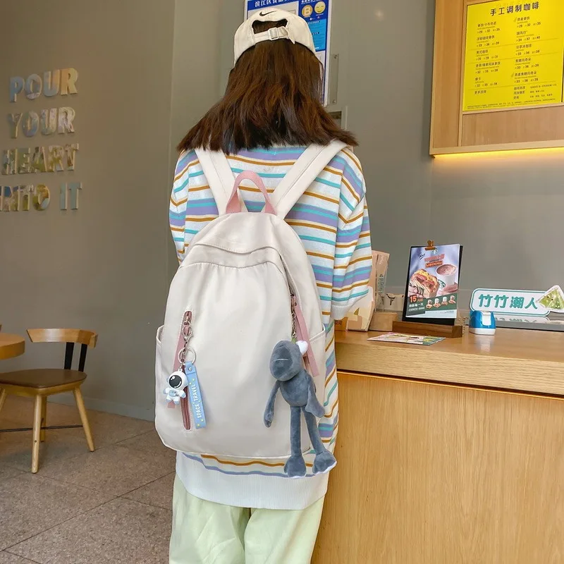 

Casual Backpacks Women 2021 Pendant Bags For Women Shoulder Bag Nylon Teenage Girl School Bag Trend Backbag Mochilas Female