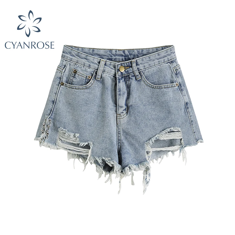 Модные рваные джинсовые шорты с карманами и потертостями на подоле женские