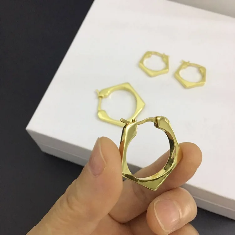 

Europe and the United States simple pentagonal brass gilded earrings personality with earrings new women's fashion
