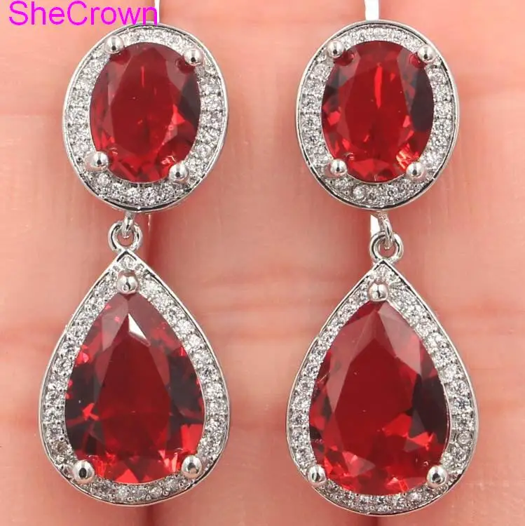 Романтические серебряные серьги в форме капли 34x14 мм с красным рубином и фианитом