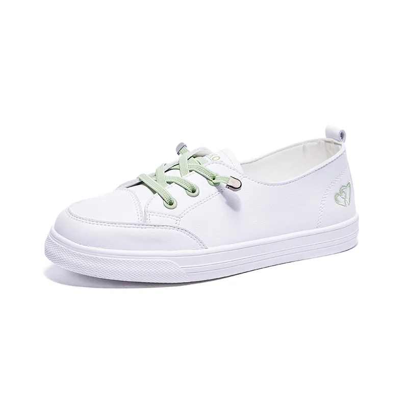 Женские кроссовки из ПУ кожи белые однотонные на плоской вулканизированной