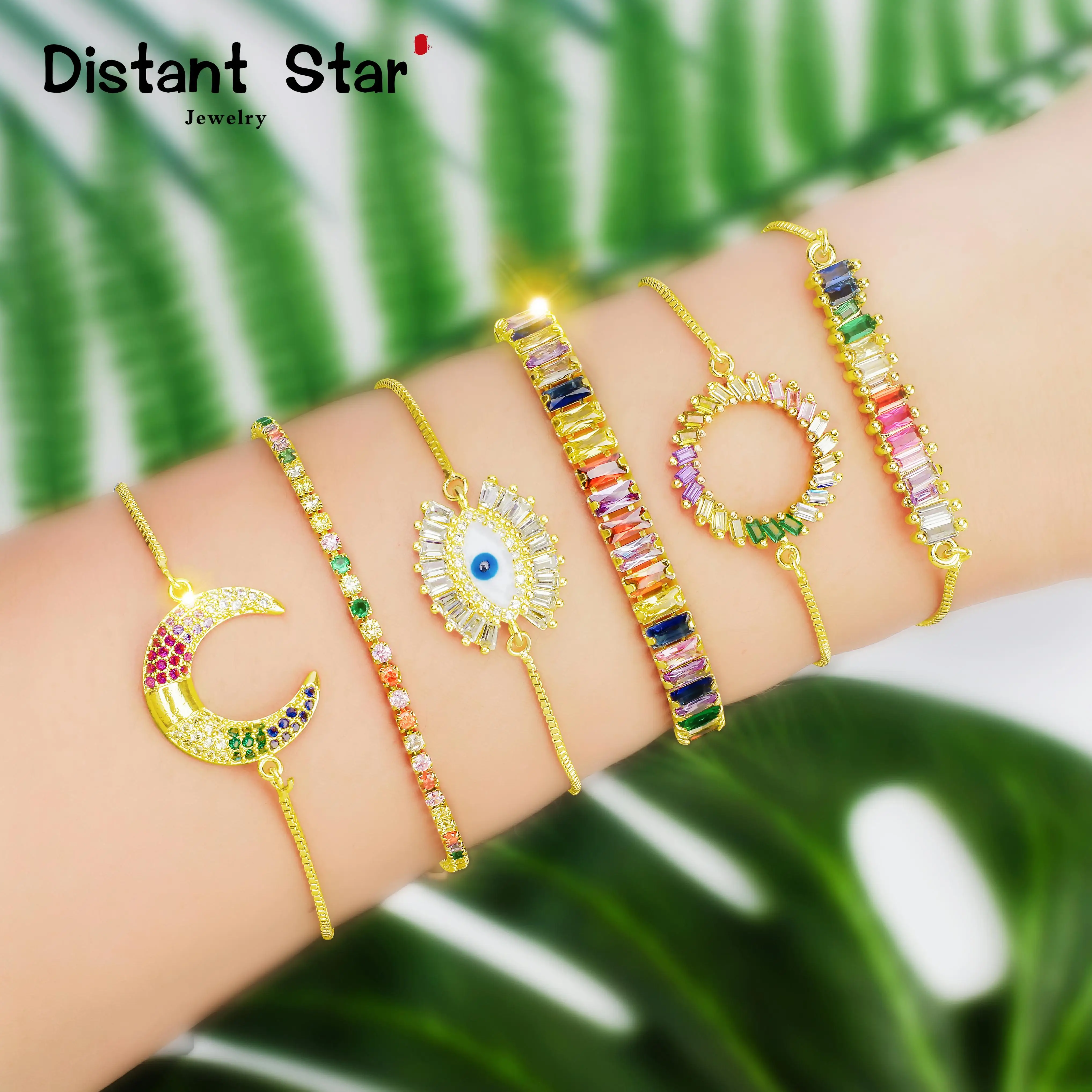 Женский браслет с разноцветным фианитом золотистого радужного цвета