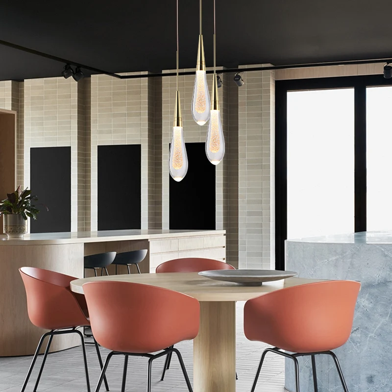 

A 2019 Hot Designer LED Water Drop pendant light minimalist Scandinavian loft Crystal Hanging Lamp Creative Restaurant Light