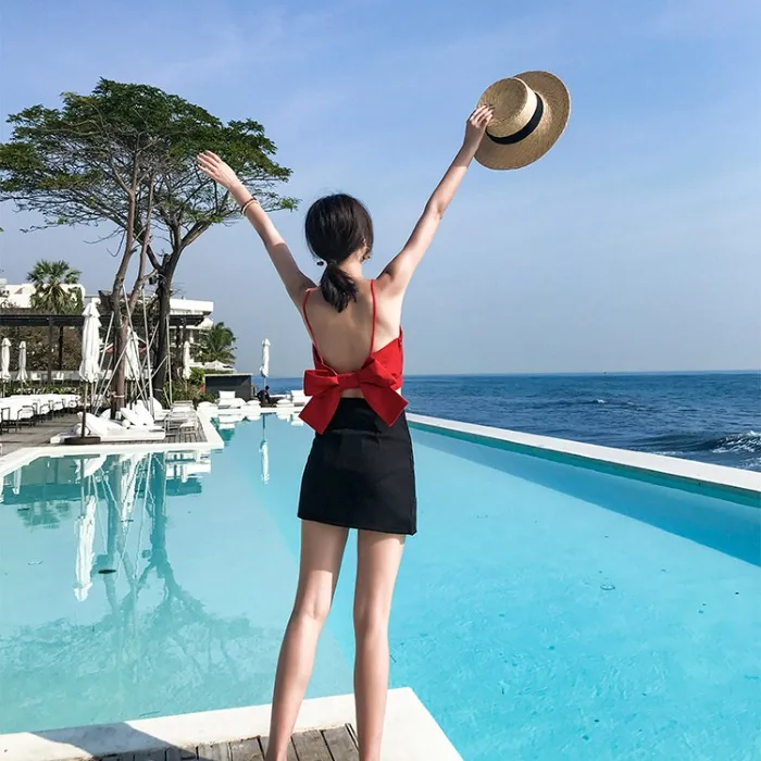 Thailand tide 2021 spring and summer new seaside holiday one line collar leaky back suspender shirt dimensional bow