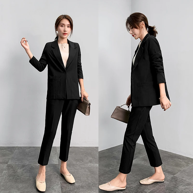 Женский костюм из двух предметов розовый с брюками Женская мода на весну и осень