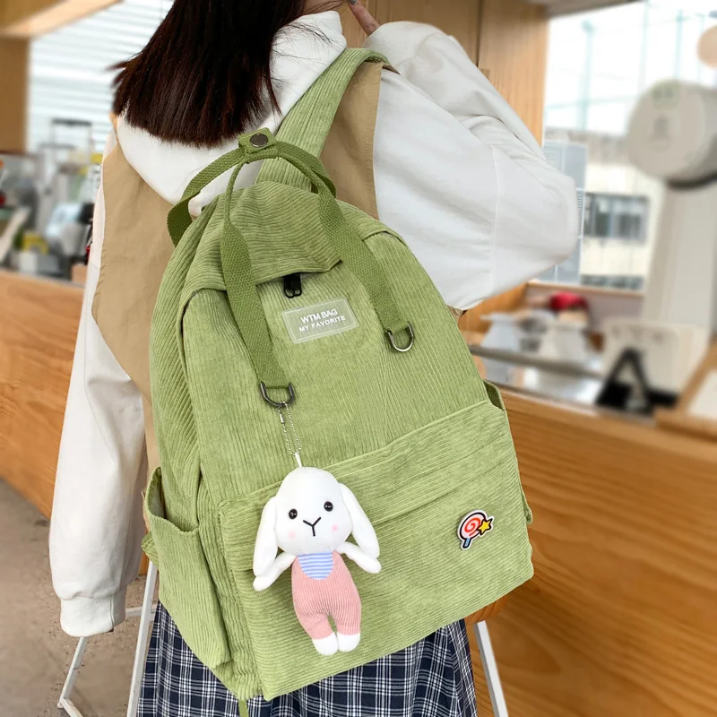 

DCIMOR New Portable Snap Fastener Women Backpack Female Solid Color Corduroy Travel Bag Teenage girl Schoolbag Korean Book Bag