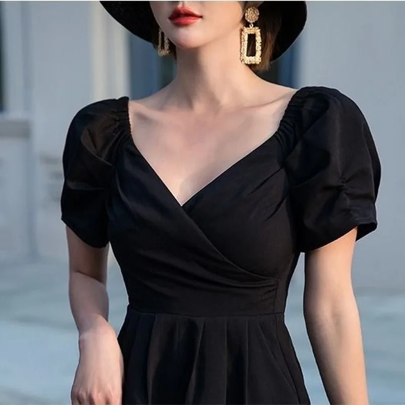 

2021 New Summer Women Sexy V-neck Short Puff Sleeve Solid Color High Waist Jumpsuit Slimming Thin Wide Leg Pants Romper Y632