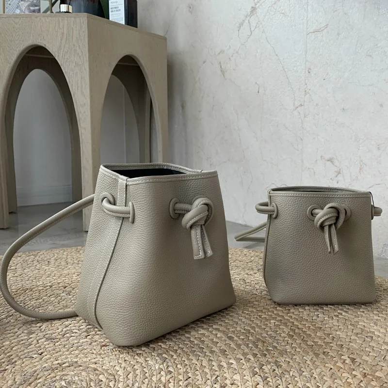 Первый слой кожаная сумка ведро ниша дизайн Drawstring через плечо Японские Женские