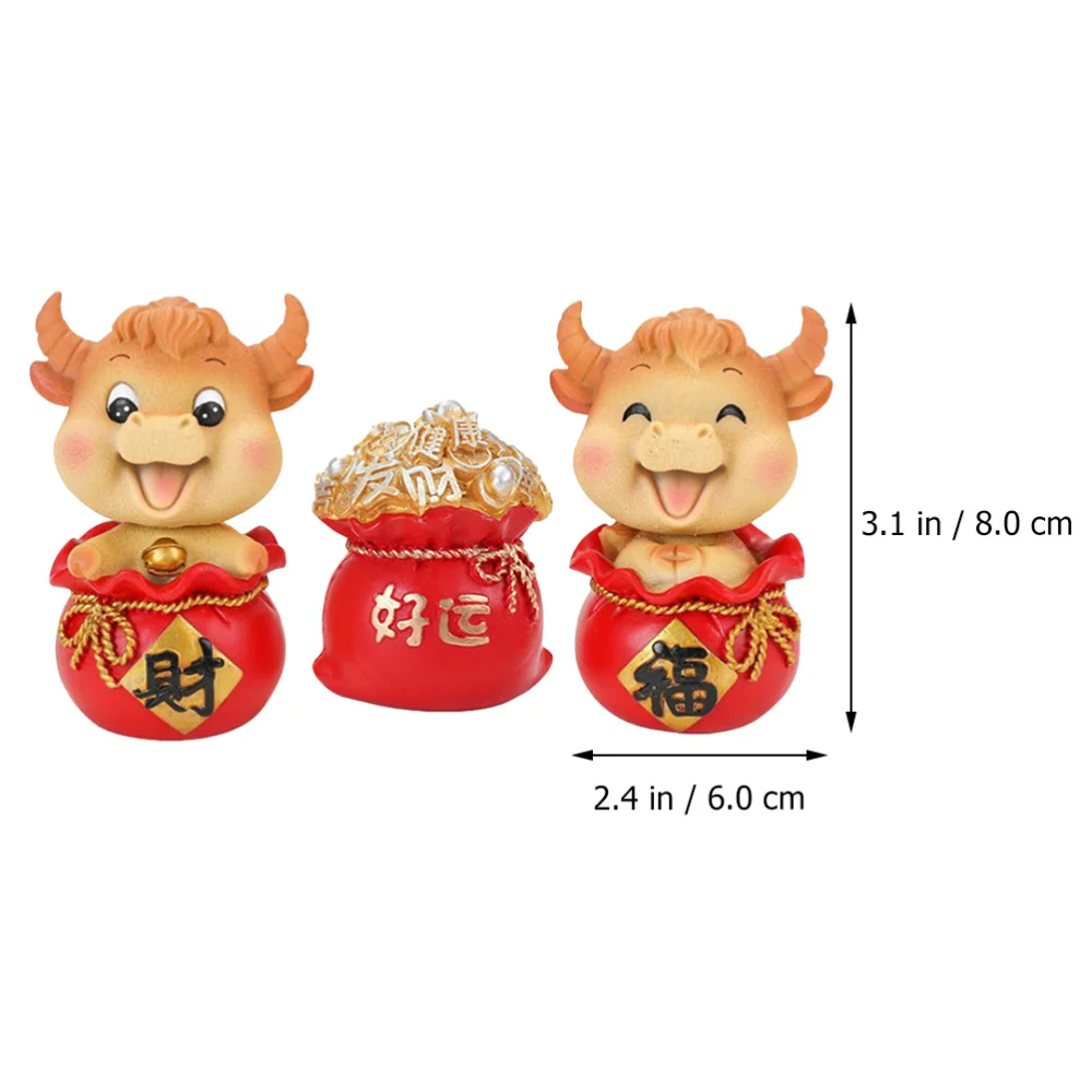 

1 Set 3pcs Lovely Car Ornaments Doll Car Year Of The Ox Mascot Ornaments (Red)