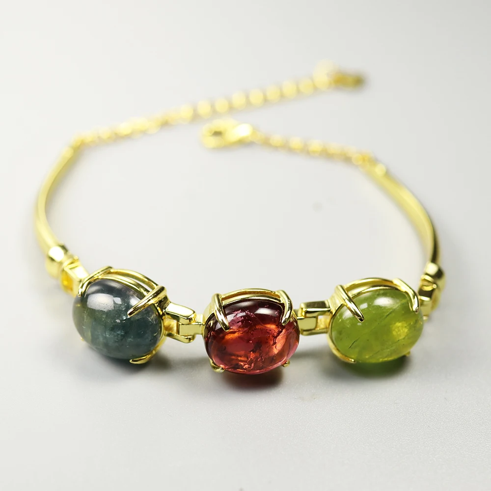 

Женский браслет с натуральным турмалином, овальной формы 10 х12 мм, 925 карата