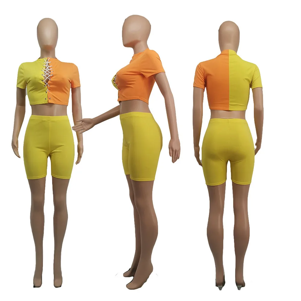 

Contrast Color Patchwork Fitness 2 Piece Suit for Women Cross Lace Up Short Sleeve Crop Top and Workout Biker Short Co Ord Set