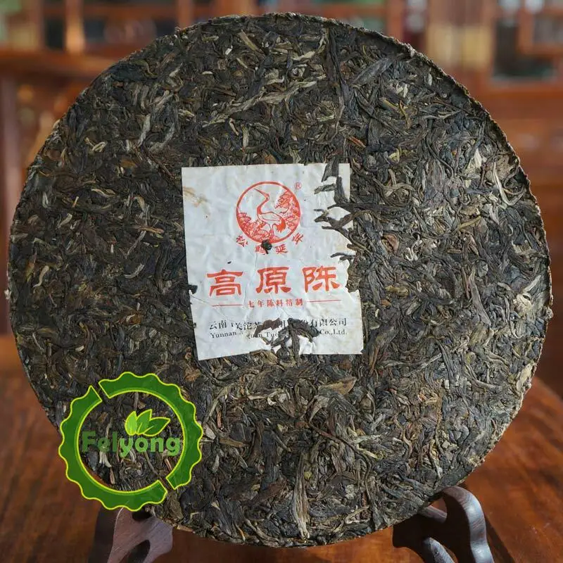 чай пуэр Xia Guan 2014 Shen Pu erh Юньнань Гао Юань Чэнь сырой Чай Железный торт 357