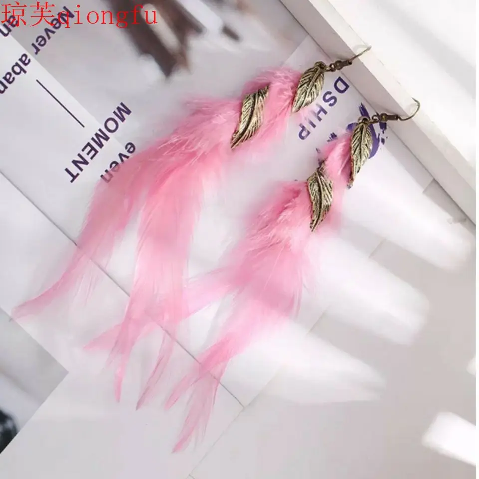 

Bohemian style personality irregular feather earrings personality tassel earrings creative women long asymmetric studs